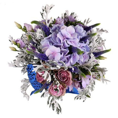 hydrangea, cappuccino rose (3 pcs.), freesia (5 pcs.), eustoma, speedwell (10 pcs.), lotus, packaging, ribbon