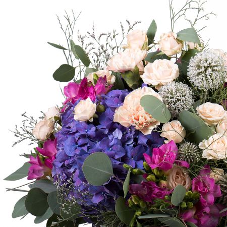 hydrangea, spray rose (9 pcs.), eucalyptus, round box, freesia (7 pcs.), oasis, packaging, ribbon