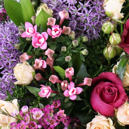 allium, premium pink rose, lilac lathyrus, chamelacium, cream spray rose, aspidistra, packaging, ribbon